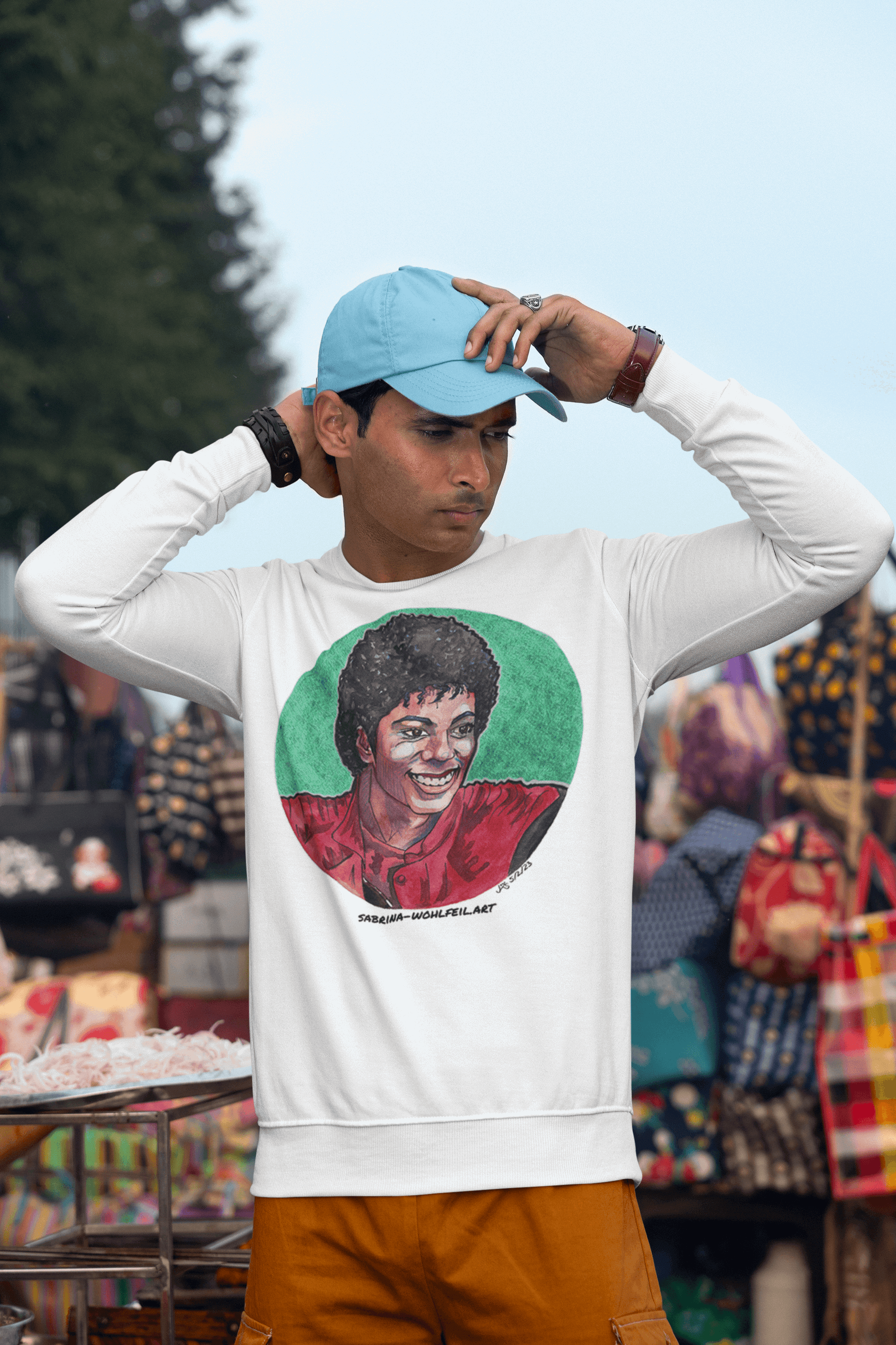 Man wearing Michael Jackson Aquarell Print Comic Sketch Unisex Sweatshirt by Sabrina Wohlfeil